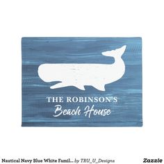 the robinson's beach house sign is painted in blue and white with an image of a