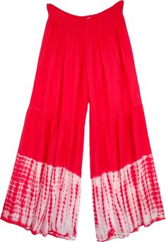 Tomato Red Palazzo Pants with Tie Dye Bottom - A beautiful pair of palazzo pants with a tier at the knee giving it a decent flare. The fresh tomato color contrasts perfectly with the pure white tie-dye on the bottom on these pants. Wear it casually at home or while going out for shopping with your friends. Pair them with a white crop top for a beach look or a navy blue or back tank top for a casual look. Comfortable and airy, the waist is elasticized giving it room for movement. These pants and Red Wide Leg Pants For Summer, Red Ankle-length Bottoms For Spring, Red Full-length Summer Bottoms, Ankle-length Red Bottoms For Spring, Red Wide Leg Pants With Elastic Waistband, Cotton Bottoms With Flared Hem For Summer, Summer Cotton Bottoms With Flared Hem, Red Cotton Pants For Vacation, Red Full-length Wide Leg Pants For Summer