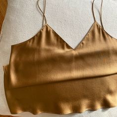 100% Silk V-Neck Cami In Copper. Size 40 - Fits Like A Medium. Originally Purchase From Etsy. Brand New And Unworn. Silk, Wedding, Party, Date, Evening, Copper, Bronze, Metallic Silk V-neck Top For Night Out, Silk V-neck Tank Top For Night Out, Trendy Gold V-neck Top, Spring Gold Silk Top, Gold Silk Top For Spring, Gold Silk V-neck Top, Gold Silk Tops For Spring, Elegant Gold Camisole For Spring, Gold Silk Top For Night Out