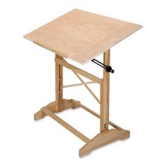 a small wooden table with a black handle on it