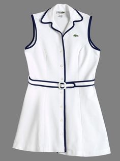 a women's white dress with blue trims on the waist and collarline