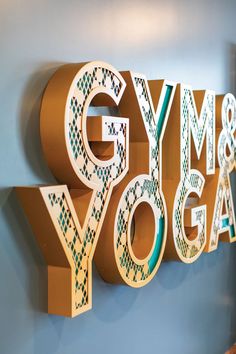 the word gym and yoga spelled out in large letters