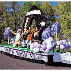 some people on a float in the street