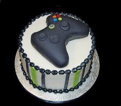 a cake decorated with a video game controller