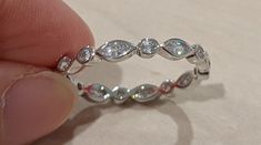 Australian seller stock 925 sterling silver Bezel marquise and round cubic zirconia all around - can't resize Stackable ring/band Sizes from 3.75 us to 12.75 us  That's from size G UK/aus to Z+1 UK/aus Weight from 2-2.3 grams VERY STRONG AND STURDY Will sent as registered mail from Australia post Sizes  3.75 us = G UK/aus 4.75 us = J UK/aus 5.75 us = L UK/aus 6.75 us = N UK/aus 7.75 us = P UK/aus 8.75 us = R UK/aus 9.75 us = T UK/aus 10.75 us = V UK/aus 11.75 us = X 1/2 UK/aus 12.75 us = Z+1 UK/aus Adjustable Marquise Jewelry For Formal Occasions, Marquise Cubic Zirconia Ring With Diamond Cut, Silver Marquise Stackable Rings As Gift, Cubic Zirconia Wedding Jewelry With Bezel Setting, Stackable Diamond White Cubic Zirconia Ring, Stackable Marquise Cut Jewelry For Weddings, Marquise Cubic Zirconia Ring With Vvs Clarity, Silver Marquise Stackable Rings For Gifts, Stackable Round Cubic Zirconia Jewelry