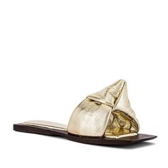 Jeffrey Campbell Aeron Flat Slide Sandal - Metallic Leather Upper With Leather Sole. Padded Footbed. Square Toe And Heel. Knot Accent At Vamp. Imported. Brand New In Box Color: Gold Size: 7 Sold Out Hard To Find Gold Slide Mules For Beach, Elegant Gold Flat Slides, Flat Slides For Summer Evenings, Flat Slides For Summer Evening, Flat Slides For Evening In Summer, Chic Gold Slides For Beach, Summer Evening Flat Slides, Gold Flat Slides For Beach, Chic Gold Slides For Vacation