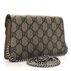 This is an authentic GUCCI GG Supreme Monogram Super Mini Dionysus Shoulder Bag in Taupe. This chic petite bag is crafted of traditional Gucci monogram-coated canvas. This shoulder bag features a removable aged silver chain shoulder strap and a textured horseshoe tiger head spurred closure. The flap opens to a compact beige interior with a key ring. Gucci Bag Dionysus, Gucci Crossbody Bag, Beige Interior, Small Messenger Bag, Gucci Crossbody, Gucci Monogram, Vintage Monogram, Tiger Head, Monogram Bag