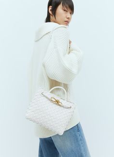 Small Andiamo handbag in intrecciato woven leather. Top handle Detachable crossbody strap Front gold-tone hardware Magnetic closure Intrecciato weave One main compartment Interior zip pocket Made in Italy 100% Leather Color: White Code: 766014 VCPP1 9156 SKU: bov0255073wht Our Products Are 100% Genuine. In All Cases We Stand By The Authenticity Of Every Product Sold On Our Site. Louis Vuitton Shoulder Bag, New Instagram, Chanel Handbags, Crossbody Strap, Leather Top, Magnetic Closure, Bottega Veneta, Luxury Bags, Top Handle