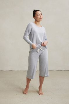 Your Comfort Uniform. Our soft and flattering raglan sleeve t-shirt paired with our capri pants with a wide soft stretch waistband and adjustable drawstring closure. Made from our signature ultra-soft and moisture-wicking fabric blend. Includes a Relaxed Long Sleeve Top and Capri Pants. Made in Canada. 93% Viscose from Bamboo / 7% Spandex. XS (0-2), S (0/2-4/6), M (6-8/10), L (10-12/14), XL (14-16/18), XXL (18-20/22). Machine washable & dryer friendly. Fabric patterns designed by and exclusive to This Is J. Casual Activewear Long Pants For Relaxation, Casual Long Pants Activewear For Relaxation, Versatile Spring Activewear For Relaxation, Versatile Relaxed Fit Activewear For Loungewear, Versatile Spring Activewear For Lounging, Versatile Spring Activewear For Loungewear, Casual Capris For Loungewear In Fall, Casual Capris For Fall Loungewear, Versatile Relaxed Fit Capris For Fall