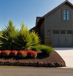 a house that has some plants in front of it