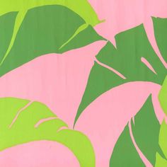 a pink and green wallpaper with large leaves on it's back drop down