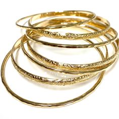 Our 7 days bangles set is make with 14k gold filled wire. Bangle is hand- formed, hammered into a faceted design and polished for a stunning texture and shine. It looks great worn alone or stack with other shell and charm bangles to create a chic, fun beachy look. This set come with 3 heirloom bangles and 4 faceted textures bangles. Each bangle is custom made to order so can not be return or exchange for that reason. Please indicate your bangle size at checkout. If you do not know your size form Hypoallergenic Gold Round Bangle, Hypoallergenic Gold Bangle, Gold Stackable Bangle, Gold Stackable Round Bangle, Dainty Stackable Round Bangle, Custom Bangle, Charm Bangles, Faceted Design, Bangles Set