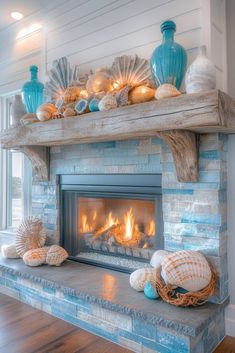 the fireplace is decorated with seashells and candles