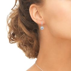 Wear these stylish earrings to enhance your daytime and evening attire. The perfect addition to any jewelry collection, these stunning earrings for women and teen girls feature 7mm cushion-cut stones made with Swarovski Zirconia delightfully set into highly polished sterling silver and are adorned with a sparkling halo border. These elegant and unique earrings are crafted of fine sterling silver and are secured by lever-backs. Nickel & tarnish free. These earrings in fine jewelry are a great Piercing Combinations, Ear Piercing Combinations, Gem Earrings, Stylish Earrings, Luxury Earrings, Heart Drop Earrings, Ruby Jewelry, Leverback Earrings, Stylish Earring