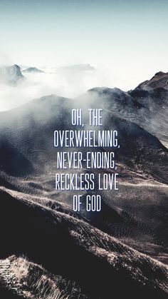 a mountain range with the words oh, the overwhelming never - ending reckless love of god