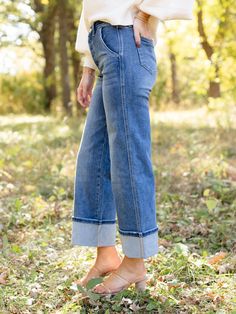 We love the wide leg and cuffed mixture that updates and elevates this new denim arrival from MICA. Falling from a super high rise design, these classic medium wash jeans feature a wider leg silhouette with a hemline that can be cuffed or uncuffed based on styling options. MICA Denim Super high rise Wide leg opening Can be worn cuffed or uncuffed Hidden button fly 68% Cotton, 30% Polyester, 2% Spandex Rise: 10" Inseam: 26.5" cuffed | 31.5" Leg opening: 18" Cuffing Wide Leg Jeans, 60's Dress, Holiday Party Outfit, Dressy Dresses, Athleisure Fashion, Mother Denim, Medium Wash Jeans, Wide Cuff, Maxi Dresses Casual