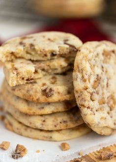 a stack of cookies sitting on top of a white plate