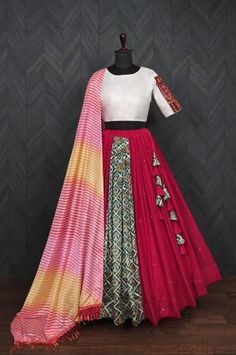 Give yourself quintessential look in navratri by wearing this viscose crochet fabric chaniya choli✨ Lehenga(Stitched) Lehenga Fabric : Viscose Crochet with position print Inner : Cotton Lehenga Waist : Support Up To 42 inch Length : 38 inch Lehenga Closure : Chain attached with dori latkan Stitching : Stitched With Canvas And Full Inner Length : 38 Flair : 4 Meter Blouse(Stitched) Blouse Fabric : Tafetta silk with traditional embroidered work Blouse Size: 38" There is Extra Margin Customer Can A White Chaniya Choli, White Chaniya, Garba Look, Cotton Chaniya Choli, Navratri Dress, Cotton Lehenga, Sabyasachi Lehenga, Navratri Chaniya Choli, Ghagra Choli