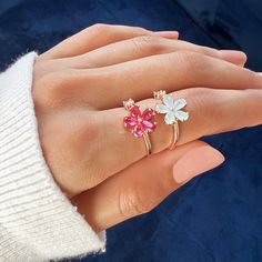 The stunning Dahlia flower is a symbol of elegance, creativity, and wealth. For centuries, this beautiful bloom has been used to express admiration and love.Keep this stunning ring close to remind yourself to love freely and always follow your heart. Rose gold plated, copper AAA cubic zirconia crystal Adjustable ring size - one size fits all Hypoallergenic, lead & nickel free If you aren't in LOVE with your purchase, please let us know within 30 days of receiving your item, and you'll receive a stress-free refund. Rose Gold Open Ring Jewelry For Valentine's Day, Rose Gold Flower Ring For Promise, Rose Gold Flower Promise Ring, Delicate Rose Gold Flower-shaped Ring, Delicate Rose Gold Flower Shaped Ring, Rose Gold Flower Ring For Valentine's Day, Rose Gold Flower Shaped Rings For Gift, Elegant Rose Gold Flower Ring For Gift, Rose Gold Open Ruby Ring For Promise