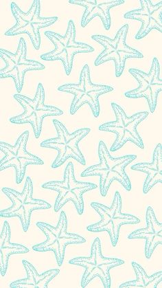 a blue and white starfish pattern is shown on a light green wallpaper background