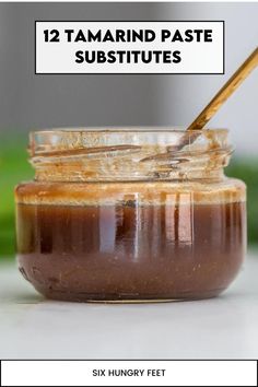 a jar filled with peanut butter sitting on top of a table