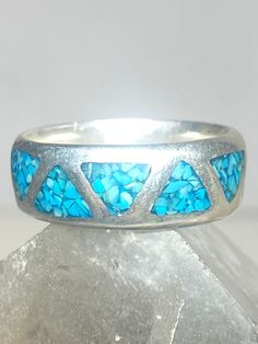 "Turquoise chips ring wedding Zuni band sterling silver women men Size 7 Weight 5g Width.    1/4\"   Free Shipping & Free Postal Insurance  Delivered in a Gift Box  Free First Class shipping and postal insurance is included. If you want to upgrade to priority kindly pay an additional fee to do so.  This is recommended if you would like to have your package delivered faster than first class which has slowed down"