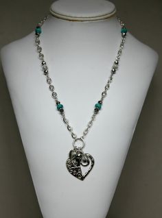 Metal Heart and Turquoise Eyeglass Holder Necklace by GemNEyes Heart Shaped Metal Jewelry With Beaded Chain, Heart-shaped Metal Beaded Chain Jewelry, Silver Heart Beads Dangle Jewelry, Silver Dangle Heart Beads Jewelry, Silver Dangle Jewelry With Heart Beads, Turquoise Jewelry With Silver Beads, Silver Heart-shaped Beaded Necklace, Metal Heart Beads For Jewelry Making, Turquoise Beaded Heart Pendant Jewelry