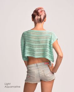 "Summer Crop Top, Cotton Knit Top, Beachy Top XS to XXL / Summer crop top made of cotton yarn. Here shown in light aquamarine. You can choose any of our colors shown in the samples! Knitted with great care in smoke-free & pet-free environment! Yarn: - 80% cotton - 20% acrylic Measurements: XS (US 0-2; UK 4-6; EU 32-34) bust - 82 cm ( 32\" ) length - 36 cm ( 14.2\" ) S (US 4-6; UK 8-10; EU 34-36) bust - 88 cm ( 35\" ) length - 36 cm ( 14.2\" ) M (US 8-10; UK 12-14; EU 38-40) bust - 94 cm ( 37 Summer V-neck Knitted Top, Green Knitted Beach Sweater, Knit Fabrication Crew Neck Sweater For The Beach, Vacation Tops With Knit Fabrication And Stretch, Beach Crew Neck Pointelle Knit Tops, Stretch Knit Tops For Vacation, Beach Green Knit Tops, Vacation Stretch Knit Tops, Green Knitted Summer Sweater