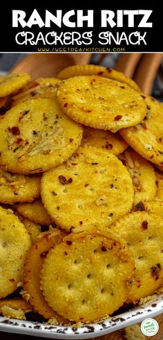 crackers are piled on top of each other in a white plate with the words ranch ritz crackers snack