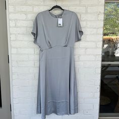 Beautiful Dress. Button Behind The Neck. Very Flattering. Zip Back Up To Waste. No Pockets. Perfect Condition Smoke Free Home H&m Short Sleeve Midi Dress For Daywear, H&m A-line Dresses, Elegant H&m Midi Dress For Daywear, H&m Elegant Short Sleeve Midi Dress, Elegant H&m Short Sleeve Midi Dress, Chic Short Sleeve Dress By H&m, Elegant H&m Midi Dress With Short Sleeves, Elegant Short Sleeve Midi Dress By H&m, Elegant Short Sleeve Dresses By H&m