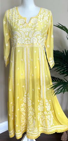 Soft flowy muslin yellow Anarkali ! Luxurious shaded fabric with hand embroidery. Kurta Length- 46 inches Traditional Summer Maxi Anarkali Set, Traditional Maxi-length Anarkali Set For Summer, Traditional Summer Anarkali Set Maxi Length, Traditional Summer Anarkali Set In Maxi Length, Summer Embroidered Anarkali Set, Embroidered Anarkali Set For Summer, Embroidered Summer Anarkali Set, Summer Anarkali Set With Floral Embroidery, Yellow Embroidered Straight Kurta Dress