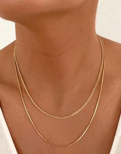 "Embrace timeless elegance this holiday with our 18k Dainty Gold Filled Chain Set. Make it uniquely yours or gift it to someone special. Elevate your holiday season with sophistication and sentiment. D E T A I L S - 18k Gold Filled Cuban and Snake Box Chain  - 1mm chains  - Lengths all available in 16\", 18\" or 20\"  - Lobster Claw Clasp  ** Explore the versatility of our chains, as they are intentionally NOT connected, allowing you to wear them together or separately for a customizable and stylish look** Create your own SET:  16\" Cuban and 18\" Smooth Snake Chain **pictured**  M A T E R I A L S At Dylan Rae, we are committed to handcrafting jewelry that is perfect for everyday wear. Our high-quality gold filled designs contain 100+ times more real gold than gold plated components. The t Gold Necklace Dainty, Layer Necklaces, Necklace Gold Jewelry, Gold Jewelry Gift, Gold Jewelry Necklace, Gold Necklace Set, Statement Pendant, Cuban Link Chain, Polish Jewelry