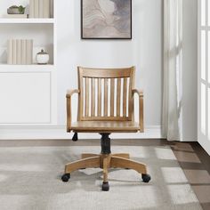 a wooden office chair sitting on top of a carpeted floor next to a book shelf