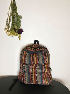 Unleash your style with our Arden patchwork backpack – Featuring adjustable straps for ultimate comfort and a front pocket for quick access. Stay hydrated on the go with water bottle holders. 70s Backpack, Indie Backpack, Boho Backpacks, Patchwork Backpack, Fit School, Hippie Backpack, Boho Backpack, Alt Clothes, Hippie Aesthetic