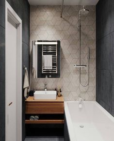 a bathroom with a bathtub, sink and mirror