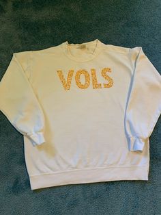 Tennessee Volunteers Floral Embroidered SweatShirt/T-Shirt. Fall College Embroidered T-shirt, White Embroidered T-shirt For Fall, Embroidered Fall College T-shirt, Embroidered Graphics T-shirt For College In Fall, School Spirit Tops With Embroidered Graphics For Fall, Embroidered School Spirit Tops For Fall, Fall College Embroidered Tops, Embroidered Fall Tops For College, School Spirit Crew Neck Top With Letter Embroidery