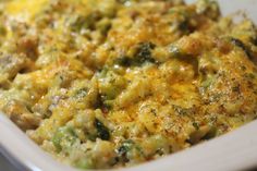 a casserole dish with broccoli and cheese