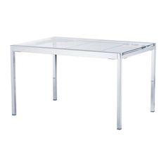 a white table with a glass top and metal legs