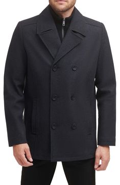 Add this classic wool peacoat to your wardrobe for an elevated style. Notched collar Long sleeves Button front Dual pockets 58% wool, 35% polyester, 4% acrylic, 3% other fibers Dry clean Imported Model stats: 6'1" height, 32" waist. Model is wearing size M. Classic Solid Pea Coat For Fall, Black Peacoat With Button Closure For Fall, Fall Black Peacoat With Button Closure, Classic Fall Pea Coat, Black Winter Peacoat With Notch Lapel, Black Peacoat With Notch Lapel For Winter, Single Breasted Wool Pea Coat For Fall, Wool Single Breasted Pea Coat For Fall, Black Fall Peacoat With Button Closure