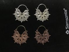 Delicately hand made earrings in shimmering white brass or copaper. Handmade White Metal Earrings, Traditional White Brass Earrings, Artistic Silver Copper Earrings, Artistic Silver-colored Copper Earrings, Silver-colored Copper Jewelry For Parties, Silver Copper Jewelry For Party, Silver Brass Hoop Earrings For Festive Occasions, Handmade Silver Hoop Earrings For Festive Occasions, Silver Copper Earrings For Party