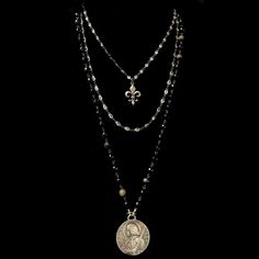 In speaking of Joan of Arc, Winston Churchill said, "Joan was a being so uplifted from ordinary run of mankind that she finds no equal in a thousand years" This Joan of Arc Necklace features a reproduction Vintage Joan of Arc medal from the 1890's on a triple strand necklace. Made of Sterling Silver it features Joan of Arc on the longest strand and a Fleur de Lis on the shortest of the two strands of channel set Austrian Crystal. At an early age, Joan was clear of her destiny and it shows on thi Joan Of Arc Inspired Dress, Gold Gothic Jewelry, Joan Of Arc Aesthetic, Gothic Moodboard, Silver Gothic Necklaces With Antique Finish, Gothic Metal Necklaces With Jewels, Joan Of Arc Necklace, Saint Necklace Silver, Equestrian Necklace