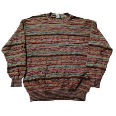 Vintage 90s Coogi Style Textured Knitted Crewneck Sweater - Classic Retro Knit Dive into the nostalgia of the 90s with this eye-catching vintage Coogi style crewneck sweater! Inspired by the iconic designs of Coogi Australia, this sweater features the same bold patterns and vibrant colors that defined an era. Perfect for fashion lovers who appreciate unique, statement pieces. Features: Era: 1990s Style: Coogi-inspired Material: High-quality 100% Cotton (Soft, warm, and durable) Design: Multicolo Unique Knitwear, Cosby Sweater, 1990s Style, Style Sweaters, Clothing Streetwear, 90s Looks, 1990s Fashion, Bold Patterns, Retro Mode