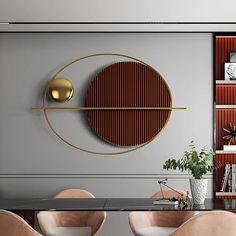 a dining room table with chairs and a wall mounted art piece on the wall behind it