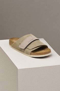 Minimalist by design to maximize on-the-go comfort. The Kyoto slide's suede upper comes together smoothly over the foot secured by nubuck hook-and-loop straps for the perfect fit. With an original contoured footbed for support it'll feel uniquely yours wherever you wear it. Contoured cork-latex footbed creates custom support with wear Suede upper nubuck leather straps Suede footbed lining helps keep you comfortable Flexible EVA sole Adjustable hook-and-loop strap Made in Germany Birkenstock Kyoto, Birkenstock Styles, Creative Background, Calf Muscles, Eva Sole, Uk Fashion, Nubuck Leather, Soft Suede, Compact Design