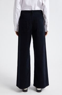 These picture-of-polish pants are textured in soft corduroy and designed in a wide-leg silhouette. Zip fly with button closure Back patch pockets 93% cotton, 6% polyester, 1% polyurethane Dry clean Made in the USA Wide Leg Courdoroy Anthropologie, Black Mid-rise Cotton Wide Leg Pants, Straight Leg Corduroy Pants With Button Closure, Nili Lotan Shon Pants, Black Pull-on Wide Leg Pants, Summer Wardrobe Essentials, Sports Blazer, Made Clothing, Denim Leggings