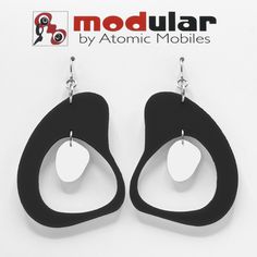 "<---------- SEE THEM IN MOTION!! Modern art earrings inspired by mid century modern retro design and my hanging art mobiles. Wearable art! Custom handmade by me in my studio in Los Angeles. No-worry, no-pain hypo-allergenic titanium ear wire, stainless steel rings, and adorably mod acrylic dangle shapes. Show your mid century modern style with these modern earrings! Arrives in lovely gift box with ribbon and includes free 2020 Atomic Mobiles Art Catalog. CHOOSE FROM 2 SIZES: Medium: 2 3/4\"h Modern Dangle Plug Earrings, Modernist Black Earrings For Gift, Modernist Black Earrings As Gift, Modern Handmade Earrings, Mobiles Art, Modern Retro Design, Kinetic Art Sculpture, Mod Jewelry, Gift Box With Ribbon