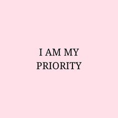 the words i am my priority against a pink background