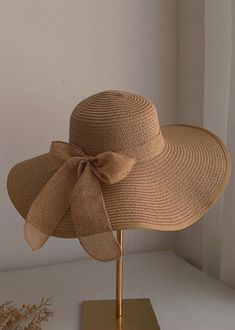 Stylish Khaki Bow Straw Woven Floppy Sun HatMade of fine Bow Straw Woven.Hat Circumference: 58cm/22.62". Matches easily with daily hairstyle, dresses & Shirts Long Linen Dresses, Floppy Sun Hat, Baggy Dresses, Woven Hat, Floppy Sun Hats, Daily Hairstyles, Linen Tshirts, Floral Dresses Long, Asymmetrical Design