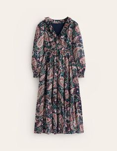 Key characteristics that define this dress: tiered hem, ruffled trims, shirring and endless versatility. Things this mini has in spades. Patterned Long Sleeve Dress With Ruffles, Long Sleeve Patterned Dress With Ruffles, Ruffle Midi Dress, Mauve Dress, Ruffle Trim, Mist, Paisley, Paradise, Midi Dress