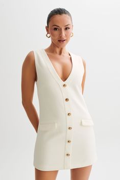 Florentina Sleeveless Suiting Mini Dress - Ivory Classic V-neck Mini Dress For Daywear, Elegant V-neck Sleeveless Dress For Day Out, Classic Sleeveless Mini Dress For Daywear, Elegant Off-white Mini Dress For Day Out, Elegant Fitted Cream Sleeveless Dress, Classic White Sleeveless Dress, Classic White Sleeveless Dress For Work, Chic Off-white Sleeveless Dress, Elegant White Sleeveless Dress For Daywear